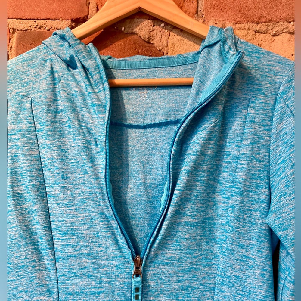 Tuff Athletics Turquoise Zip Up Jacket with Side Pockets. Size: Small (MAY 7)